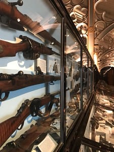 Glass case with hunting guns