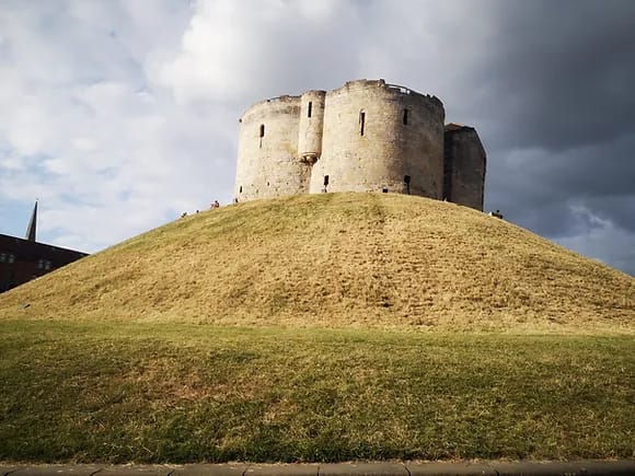 Medieval tower on a hill or mound