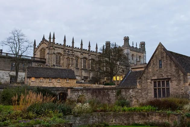 View of a medieval building at dusk: Christ Church College in Oxford. 