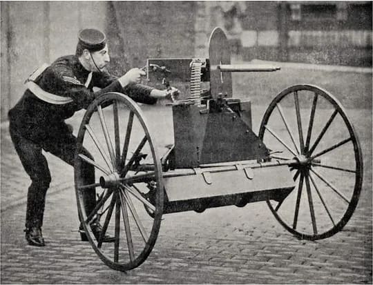 Photograph of galloping Gun-Carriage with Maxim Gun, from 'South Africa and the Transvaal War' by Louis Creswicke (1900), Bridgeman Images