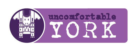 uncomfortable-york-logo-on-purple-05062023